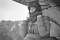 Adjustable face-hole, and extra-length at front & back for tucking-in.