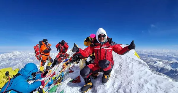 Sherpa Tenji summits Everest in a PHD Double Down Suit
