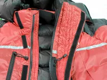 Jacket showed flared over-baffle (to protect water drips from oxygen-mask freezing on zip)