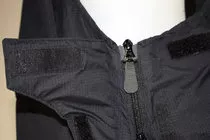 Side zips undo fully (at the top). No need to remove boots/crampons.
