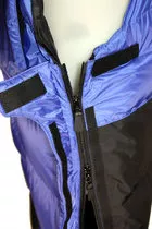Side zips undo fully (at the top). No need to remove boots/crampons.